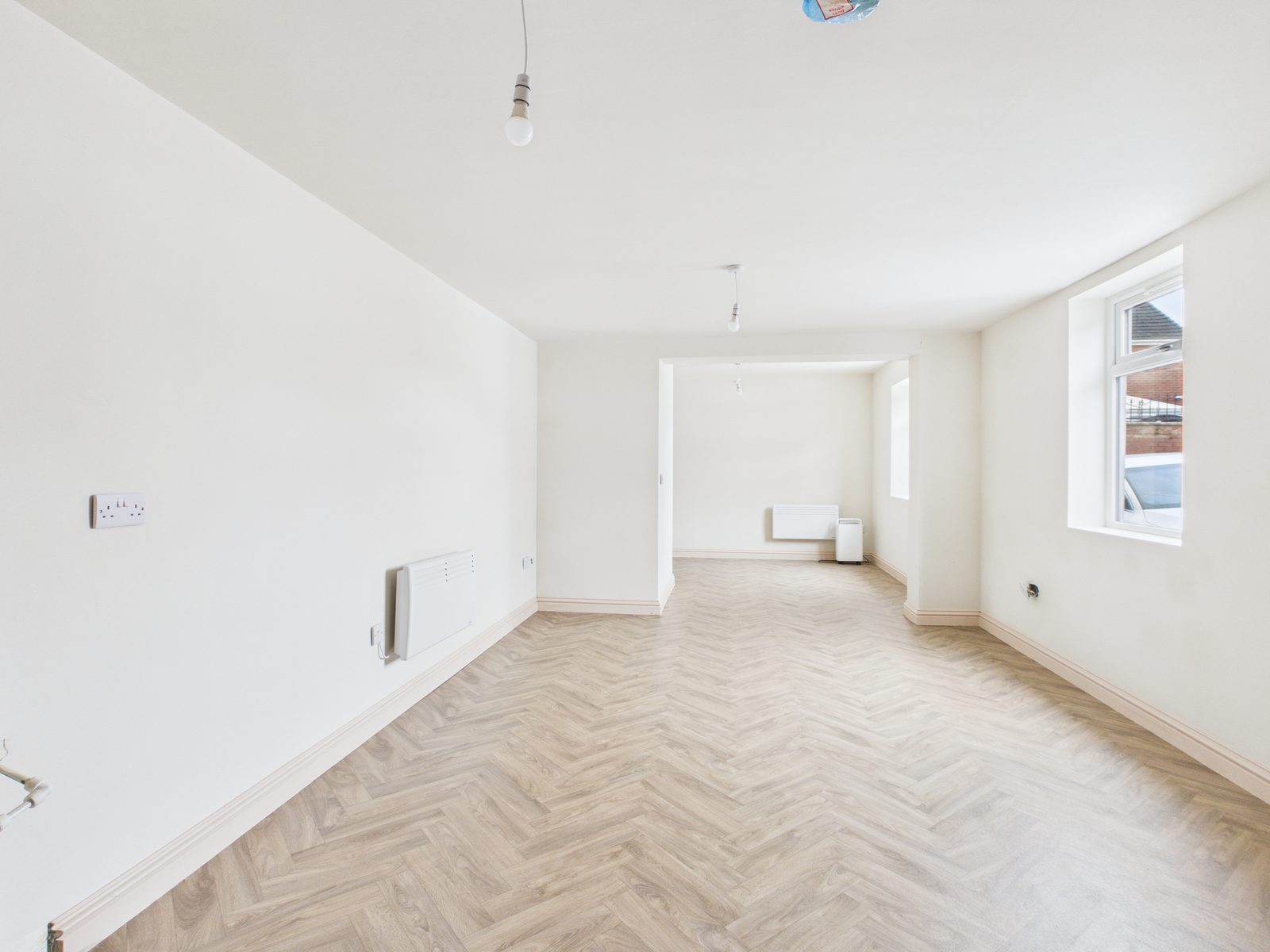 Ormskirk Road — open-plan living and kitchen with herringbone flooring