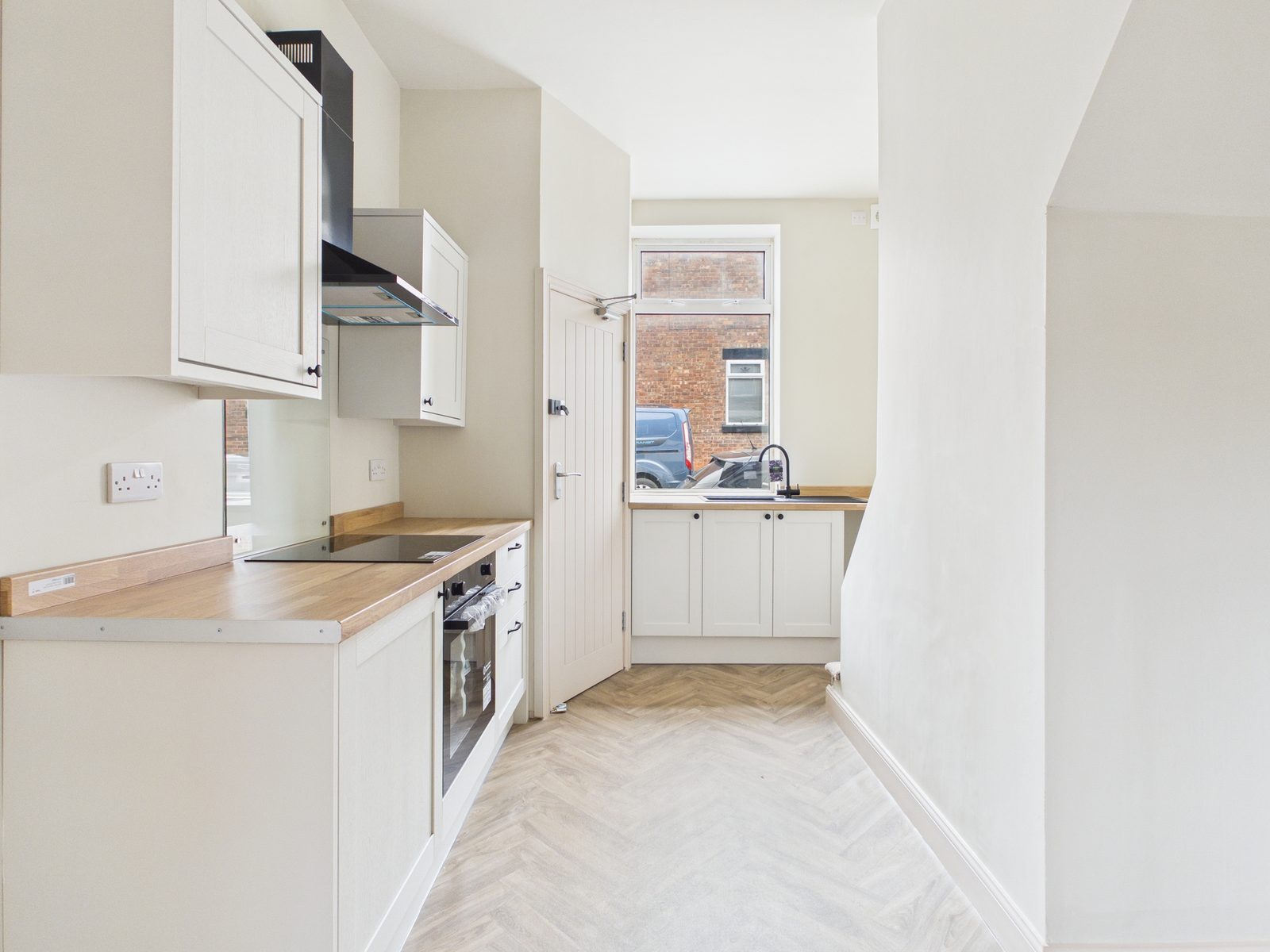 Ormskirk Road — fitted kitchen with shaker units and butchers-block worktop